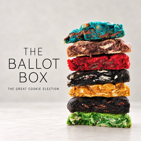 A vertical stack of seven colorful artisan cookies on a light gray surface, with the text 'THE BALLOT BOX' and 'THE GREAT COOKIE ELECTION' printed on the left side.